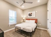 Thumbnail 89 of 94 - a bedroom with a bed and night stand at Vantage Luxury Apartments in  Cape Coral, FL