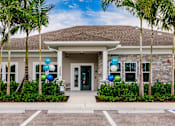 Thumbnail 1 of 94 - exterior view of Vantage Apartments clubhouse in cape coral, fl