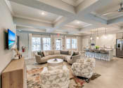 Thumbnail 22 of 94 - community lounge area with chairs and tables at Vantage Luxury Apartments in  Cape Coral, FL