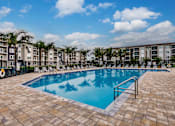 Thumbnail 6 of 94 - a swimming pool at Vantage Luxury Apartments in  Cape Coral, FL