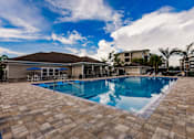 Thumbnail 4 of 94 - the swimming pool at Vantage Luxury Apartments in Cape Coral, Fl