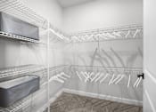 Thumbnail 25 of 83 - A white laundry room with a white ironing board and ironing rack.