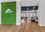 Thumbnail 1 of 42 - Aurora clubhouse with a green wall and neon sign
