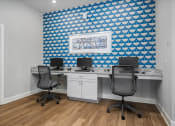 Thumbnail 5 of 42 - Room with a long desk with computer monitors and chairs