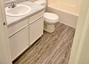 Thumbnail 17 of 17 - a bathroom with a sink toilet and shower