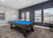 Thumbnail 17 of 42 - a games room with a pool table