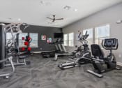 Thumbnail 12 of 42 - fitness center with cardio equipment and weight machines