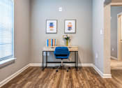Thumbnail 32 of 34 - A chair and desk in a room at the Flats at Sundown in North Port, Florida