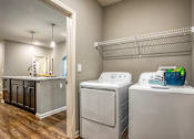 Thumbnail 34 of 34 - Washer and dryer in a closet at the Flats at Sundown