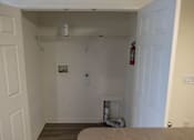 Thumbnail 41 of 41 - A photo of where a washer and dryer should go.