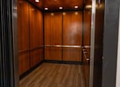 Thumbnail 16 of 41 - a photo of an elevator