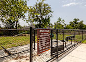 Thumbnail 33 of 39 - A sign in front of a fence that says Dark Park.
