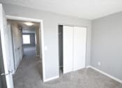 Thumbnail 23 of 25 - An empty bedroom with carpet at Cobalt Apartments in Kokomo, Indiana