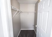 Thumbnail 13 of 18 - Large closet with white walls and a shelf at Conner Court apartments in Connersville, IN
