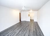 Thumbnail 11 of 17 - Empty living room with a ceiling fan at Canterbury House Newburgh Apartments in Newburgh, IN