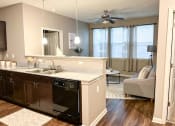 Thumbnail 13 of 22 - A kitchen counter and sink at The Lofts at Canterbury in Slidell, Louisiana
