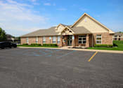 Thumbnail 3 of 15 - Exterior view of Canterbury House Apartments in Kalamazoo, Mi