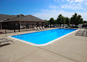 Thumbnail 9 of 15 - swimming pool at Canterbury Apartments in Kalamazoo, MI