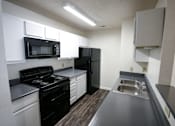 Thumbnail 3 of 5 - kitchen at batesville apartments