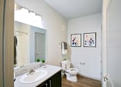 Thumbnail 31 of 31 - a bathroom with a sink toilet and a mirror