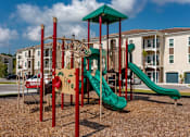 Thumbnail 9 of 34 - the playground with slides and climbing rungs at the Flats at Sundown in North Port, Florida