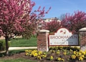 Thumbnail 16 of 21 - A sign that says Brookhaven stands in front of a building.