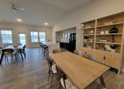 Thumbnail 3 of 28 - a dining room and living room with a table at Southern Meadows Apartments