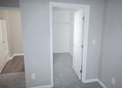 Thumbnail 16 of 18 - A white doorway leads to another room.