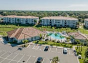 Thumbnail 1 of 22 - Aerial view of Trillium apartments clubhouse in Melbourne, fl