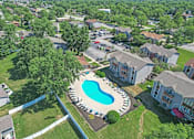 Thumbnail 15 of 16 - Aerial Pool View at Whitcomb Terrace Apartments, Merrillville, IN