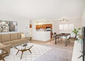 Thumbnail 8 of 19 - A living room with a brown couch and a coffee table at Hampton in Highland Apartments, Indiana, 46322