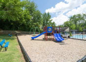 Thumbnail 20 of 28 - our apartments showcase a playground at Stonewater Apartments, Louisville, 40241