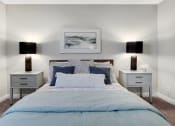 Thumbnail 12 of 28 - a bedroom with a bed and two night stands at Stonewater Apartments, Louisville, KY 40241