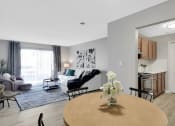 Thumbnail 4 of 28 - a dining room table with a vase  at Stonewater Apartments, Louisville, KY 40241of flowers on top of it