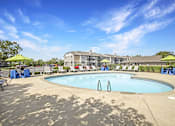 Thumbnail 4 of 31 - Swimming Pool And Relaxing Area at Southridge, Kansas, 66103