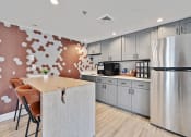 Thumbnail 18 of 25 - Gourmet Kitchen With Island at Rivers Edge Apartments, Waukesha