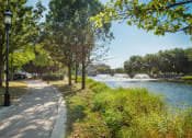 Thumbnail 3 of 25 - Walking Path at Rivers Edge Apartments, Wisconsin, 53186