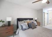 Thumbnail 12 of 25 - Bedroom With Ceiling Fan at Rivers Edge Apartments, Waukesha, Wisconsin