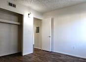 Thumbnail 12 of 15 - a bedroom with a large closet and a window