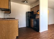 Thumbnail 6 of 20 - a kitchen and living room in an apartment