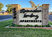 Thumbnail 20 of 20 - An exterior monument sign that reads Spinnaker Landing Apartments