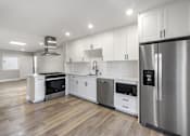Thumbnail 1 of 64 - Kitchen at Ocean Breeze Terrace Apartment, California