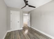 Thumbnail 14 of 64 - bedroom with ceiling fan at Ocean Breeze Terrace Apartment, Huntington Beach, CA, 92648