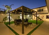 Thumbnail 43 of 64 - Pergola with seating outdoor at Ocean Breeze Terrace Apartment, Huntington Beach, 92648