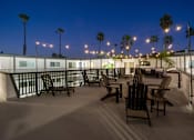 Thumbnail 57 of 64 - Deck at Sunset at Ocean Breeze Terrace Apartment, Huntington Beach, 92648