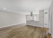 Thumbnail 24 of 64 - renovated kitchen and living room at Ocean Breeze Terrace Apartment, California, 92648