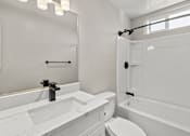 Thumbnail 9 of 64 - renovated bathroom at Ocean Breeze Terrace Apartment, Huntington Beach