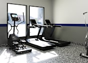Thumbnail 27 of 27 - A gym with treadmills, elliptical machines, and a stationary bike.