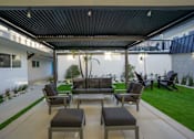Thumbnail 41 of 64 - pergola with seating area at Ocean Breeze Terrace Apartment, Huntington Beach, CA, 92648