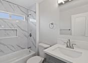 Thumbnail 4 of 14 - Bathroom With Bathtub at Charle Square Apartments, Costa Mesa